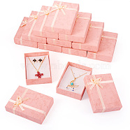 Cardboard Jewelry Set Packaging Boxes, with Sponge Inside, for Rings, Small Watches, Necklaces, Earrings, Bracelet, Rectangle with Bowknot, Pink, 10.8x7.9x2.9cm(CON-TAC0008-05C)