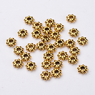 Tibetan Style Alloy Flower Spacer Beads, Cadmium Free & Lead Free, Antique Golden, 5.5x2mm, Hole: 1.8mm, about 6300pcs/1000g(TIBEB-0885-AG-LF)