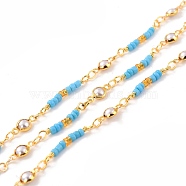 Handmade Brass Beaded Chains, with Glass Flat Round Link & Seed Beads, Long-Lasting Plated, Soldered, with Spool, Golden, Sky Blue, Link: 10x4.5x2.5mm, 2.5x1~3mm(CHC-C019-11)