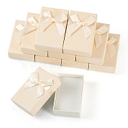 Rectangle Paper Jewelry Set Gift Box, with White Sponge Mat and Bowknot, for Rings, Necklace, Earrings, Light Goldenrod Yellow, 8.4x5.4x2.5cm(CON-TAC0013-01C)