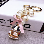 Fashionable Pearl Keychain for Ladies' Handbags - Rotating Carousel Keyring Pendant(ST2825842)